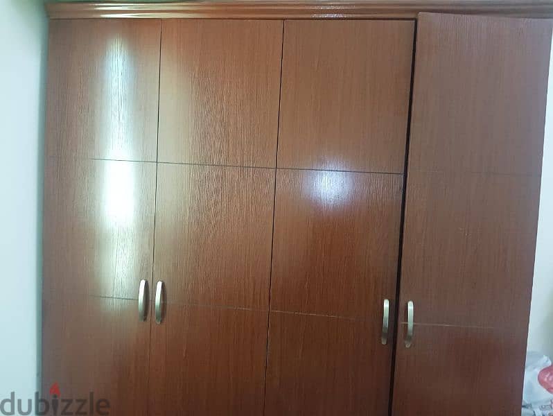 4 door cupboard with 2 side cabinet 0