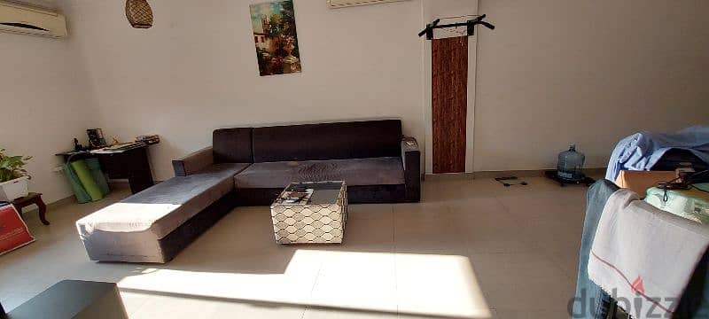 L shaped sofa and teapoy 1