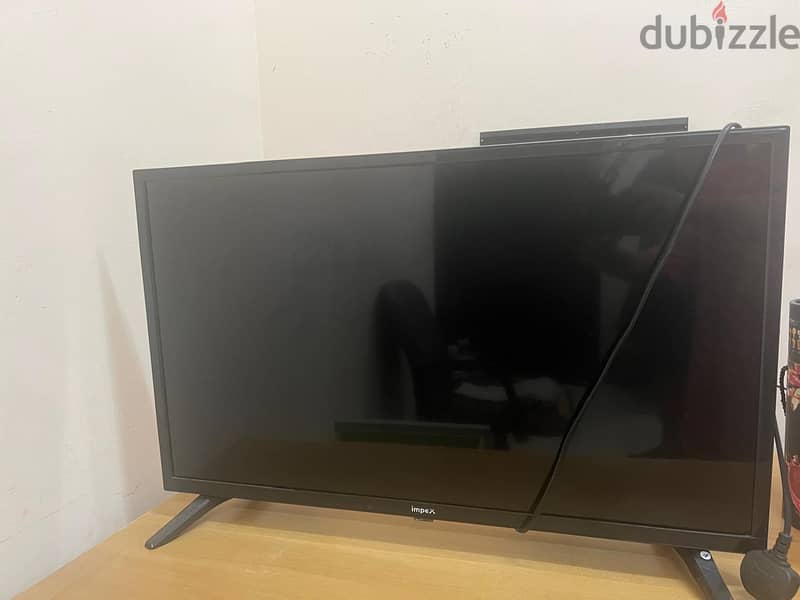 SAMSUNG AND IMPEX TWO TVS 0