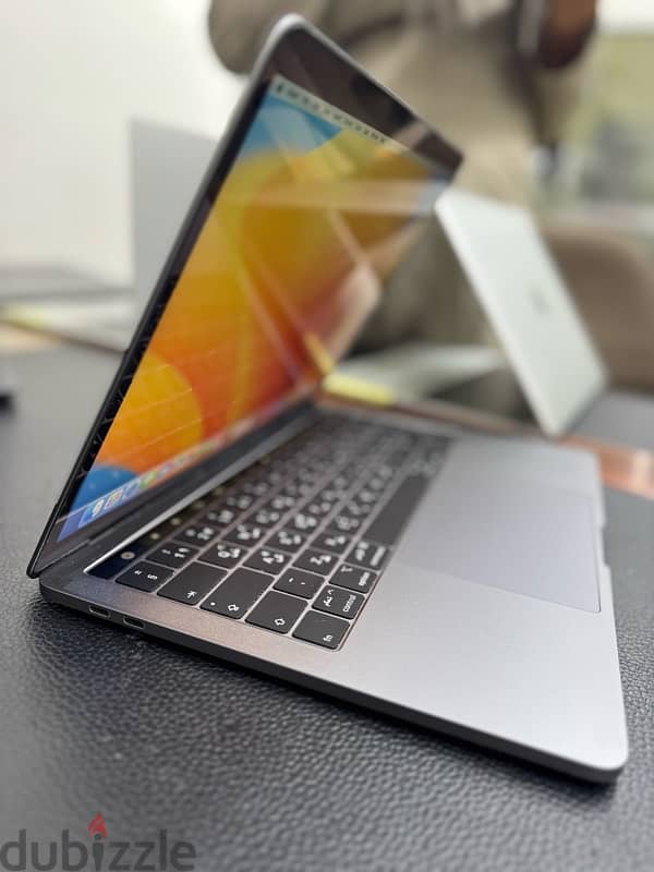 MacBook Pro 2018 Touch bar core i7 with 16gb ram 1