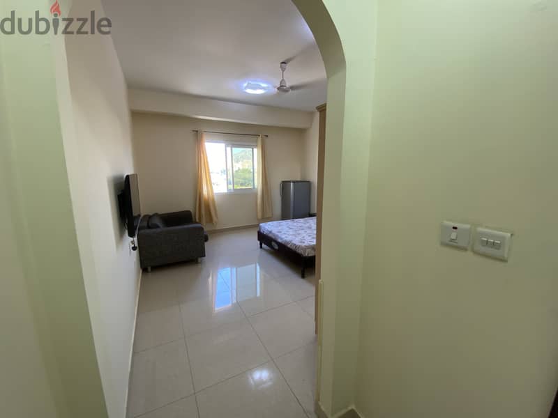 FULLY FURNISHED spacious room with attached bathroom in Al Ghubra 4