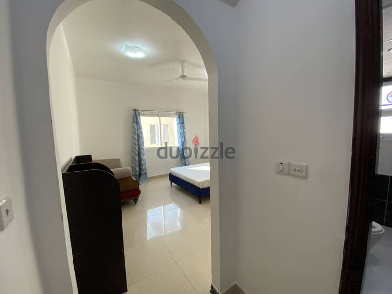 Neat and clean spacious Furnished Room + attached toilet in Al Ghubra 4