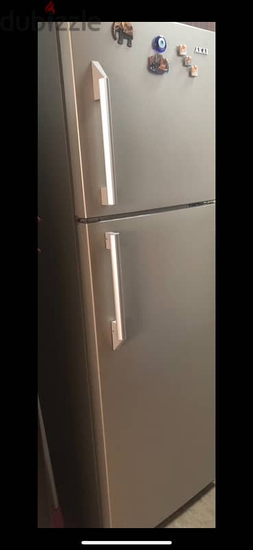 refrigerator in great condition, location: Maabailah 1