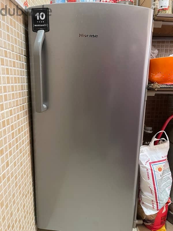 Hisense fridge and side table 0