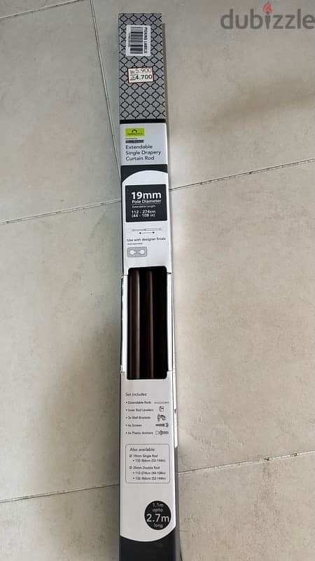 curtain rods adjustable. brand new. . ! 0