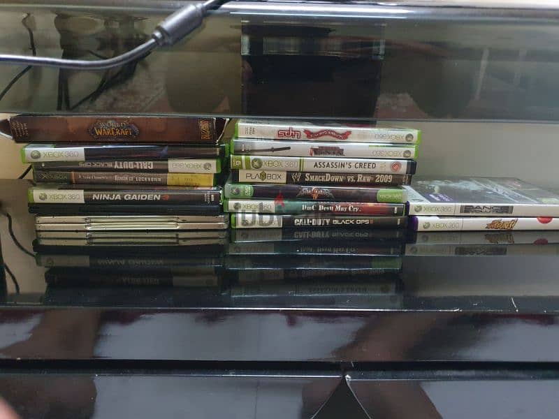 360 gemes with 2 controller with 15+ games with tv trolley 1