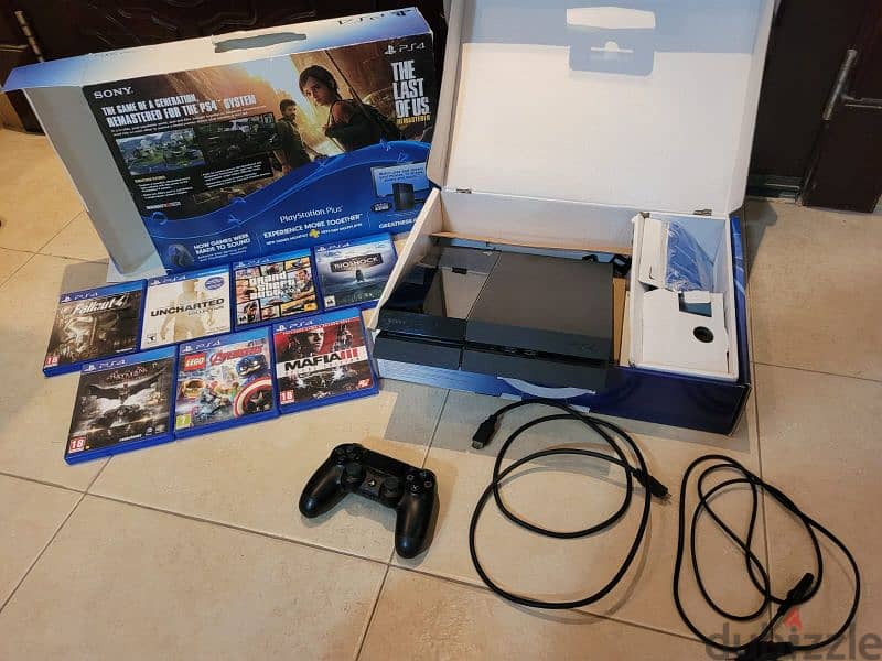 PS4 500GB with controller and two games 0