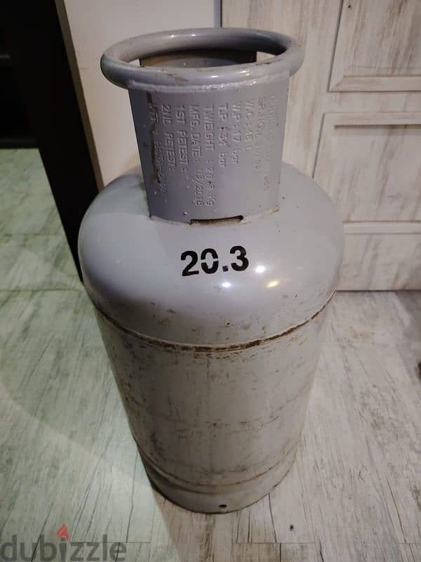 used gas cylinder. around half full 0