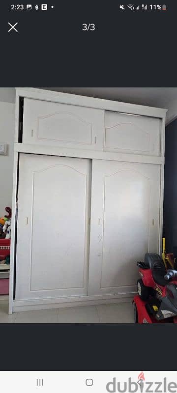 White Wadrobe with sliding doors and top cabinets 0