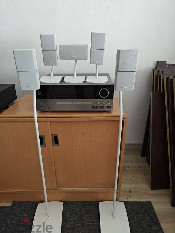 Bose double cube speaker with stands. 1