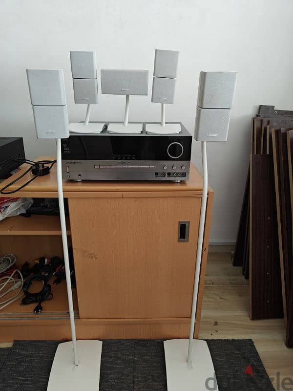 Bose double cube speaker with stands. 2