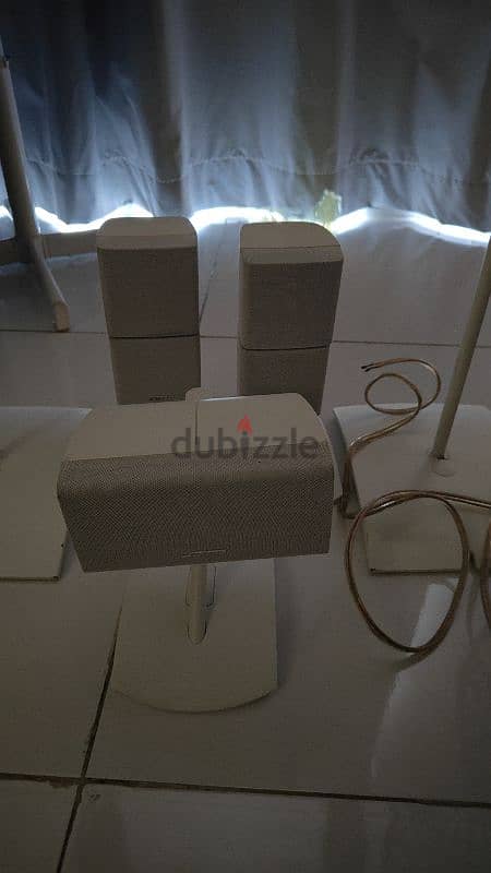 Bose double cube speaker with stands. 3