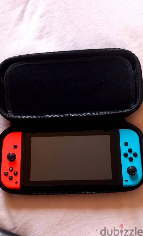 NINTENDO SWITCH AND ACCESSORIES 0