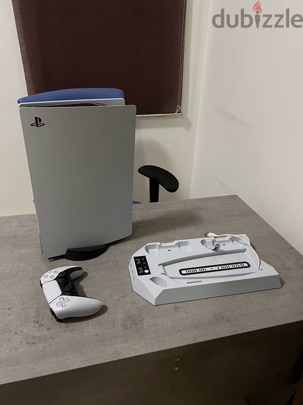 PS 5 console + controller + cooling stand 1