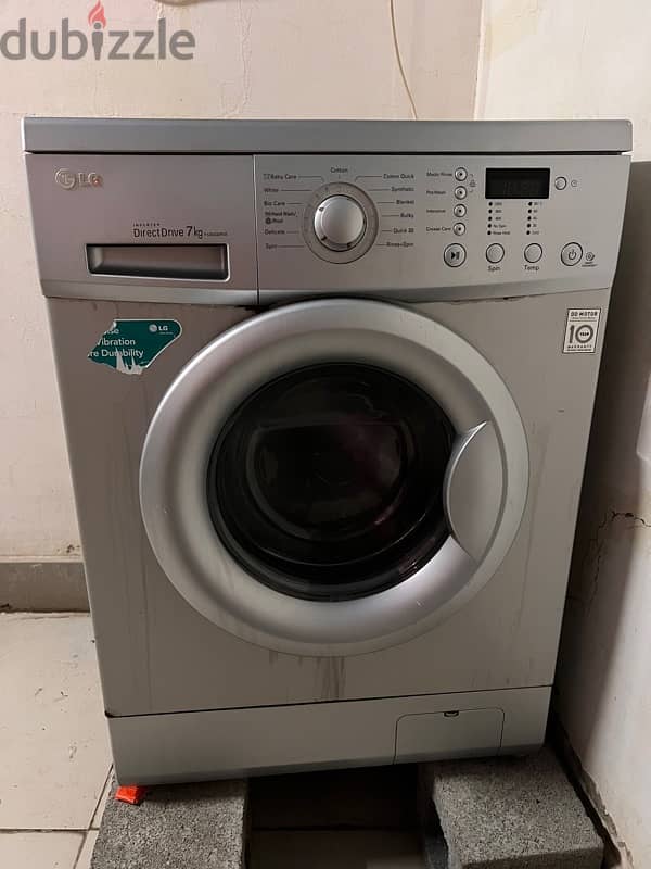 LG 7-8 Kg front load washing machine in good condition 0