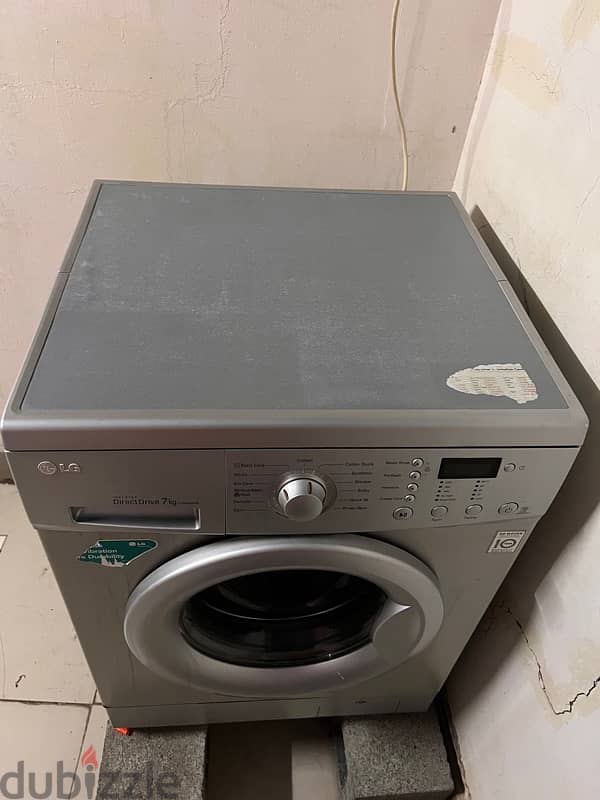 LG 7-8 Kg front load washing machine in good condition 1