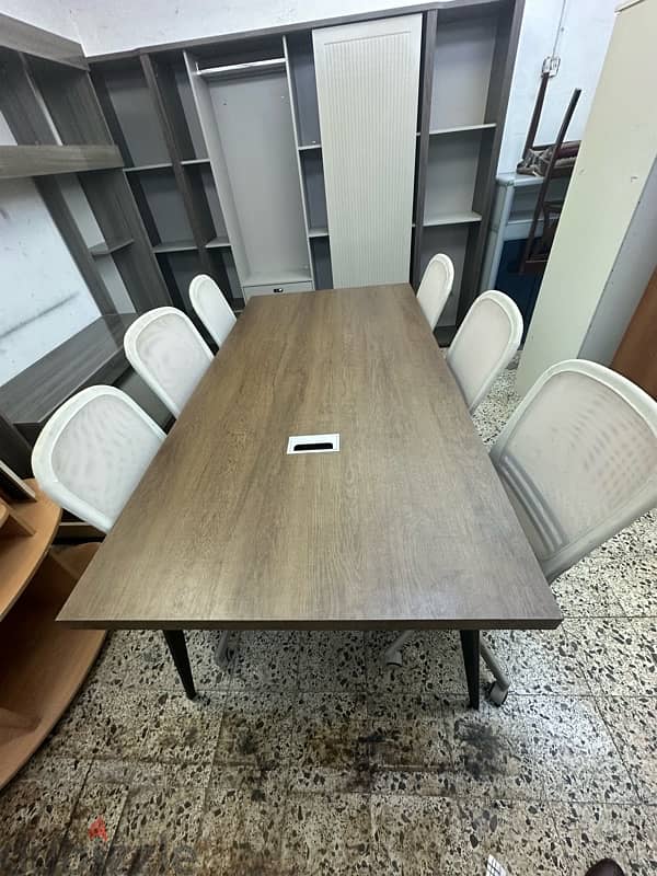 meeting table with 6 chairs for sale almost like new 1