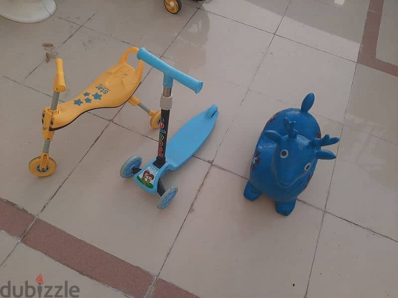 2 scooters & 1 hopping toy 0