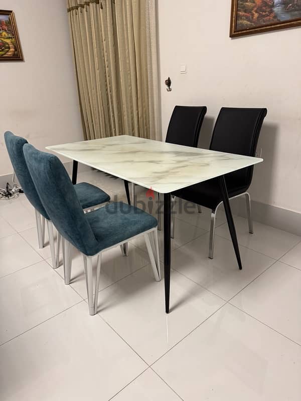 Good condition table and 4  chair available for sale 0