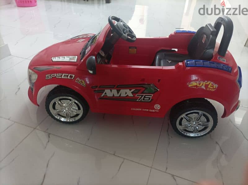 kids driving car in good condition 1