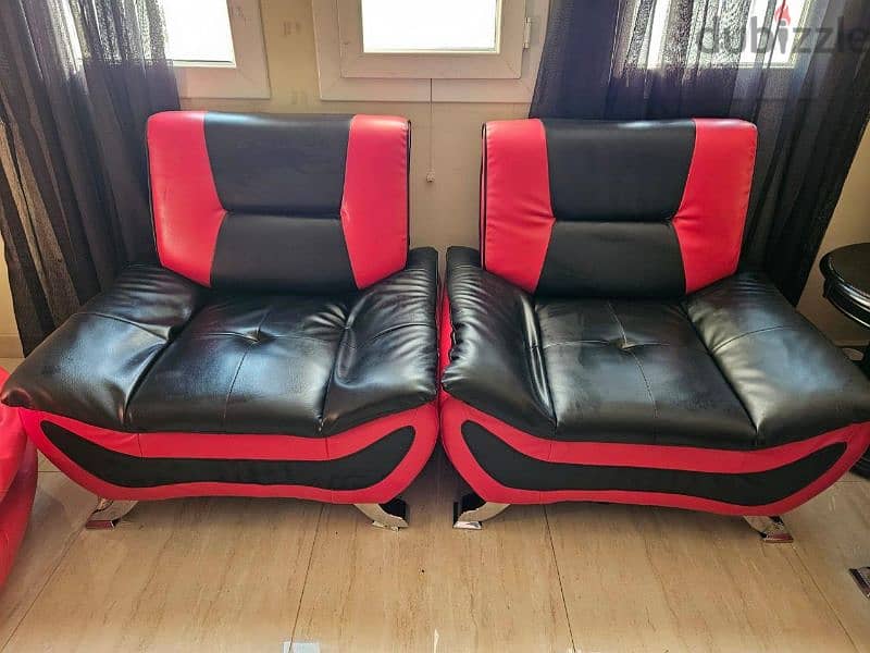 Leather sofa set 3 seater and  2 seater.    Rarely used 1