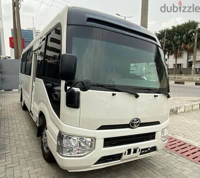 available Toyota coaster ( 2023 ) bus for rent