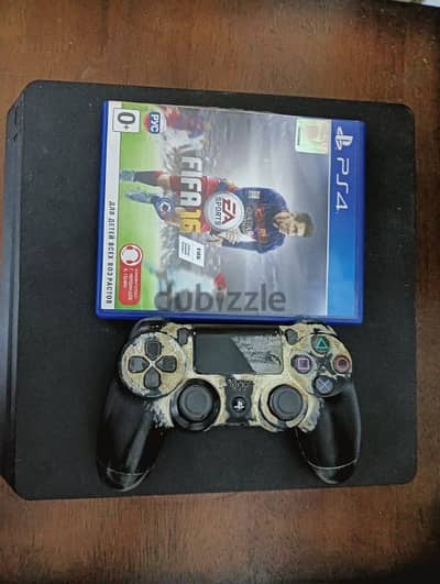 PS4 with FIFA 16 and a controller