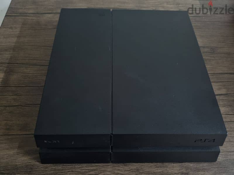 PS4 1TB And 2 Controllers ( And Extra Games For 5 Rials Each) 0