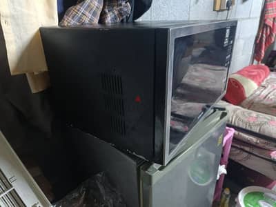 2 microwave for sale just 40 OMR