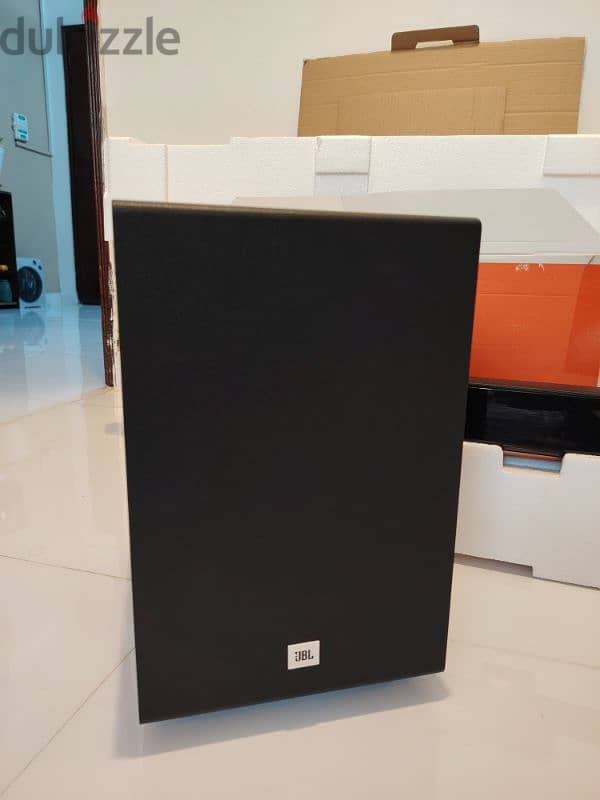 JbL  brand  subwoofer and sound bar 1