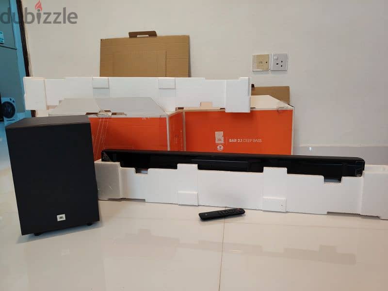 JbL  brand  subwoofer and sound bar 2