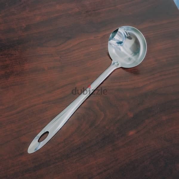 Oil seperation spoon 1