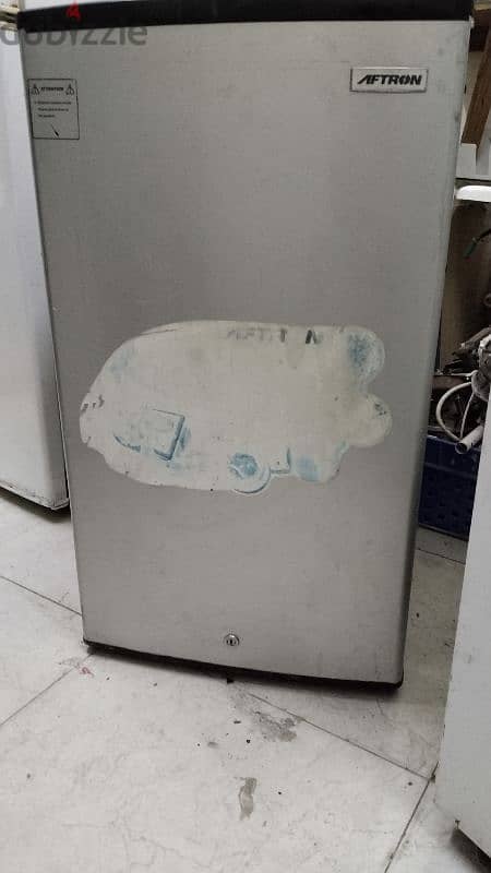 small fridge and washing machine ph# 95406131 0