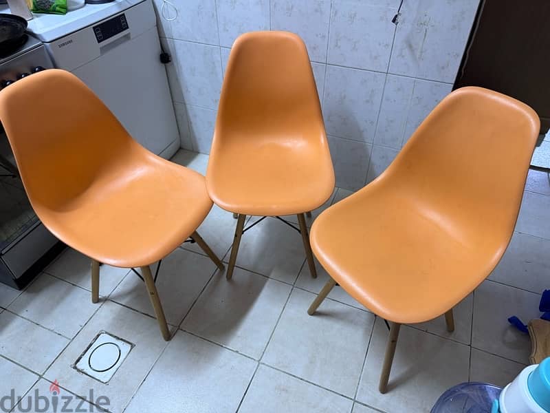 Three comfortable light chairs. 1