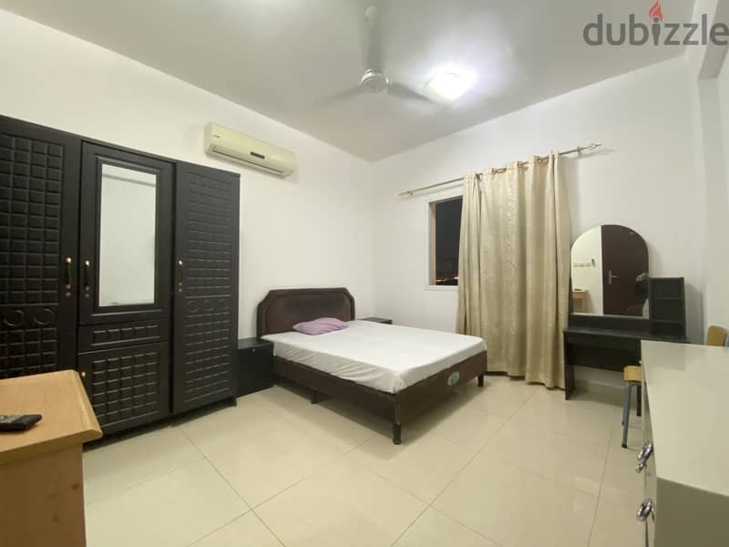 Fully Furnished spacious room + private attached bathroom in Al Ghubra 0