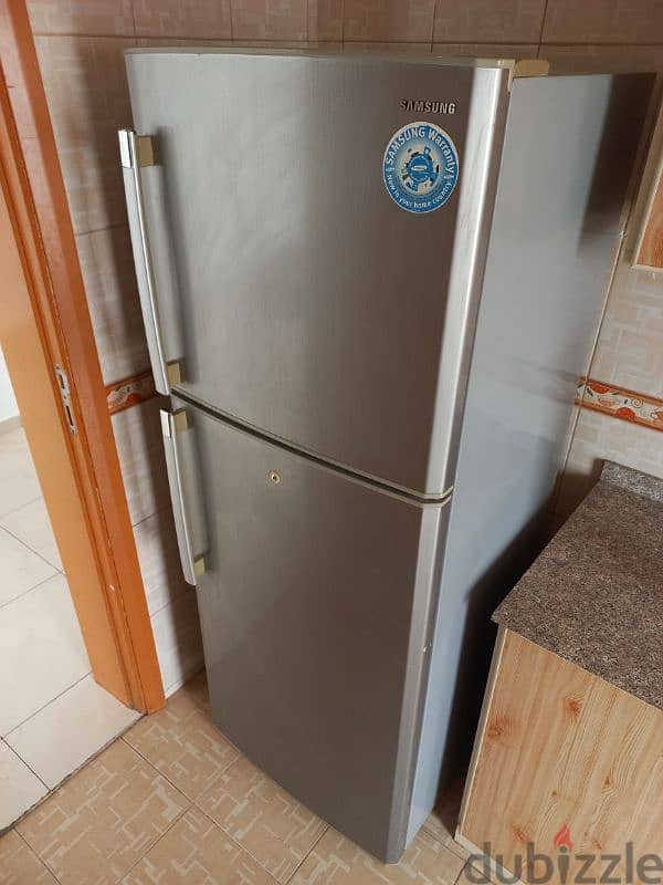 Samsung refrigerator and washing machine together, only 85 OMR 11