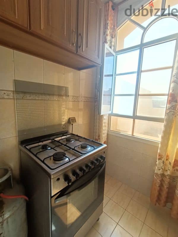 Ghubrah North studio flat fully furnished room bathroom kitchen 7