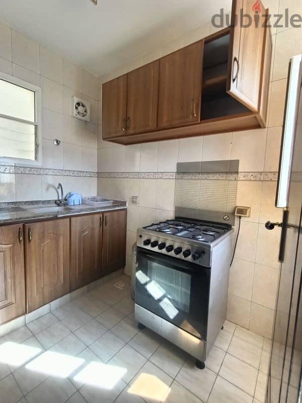 Ghubrah North studio flat fully furnished room bathroom kitchen 8