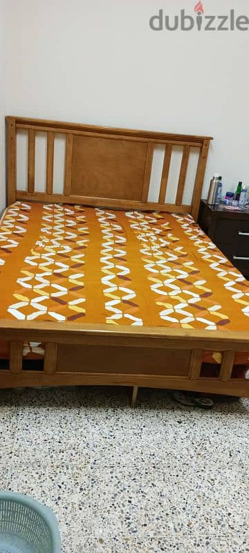 Queen size bed, dining table with four chairs, chair 1