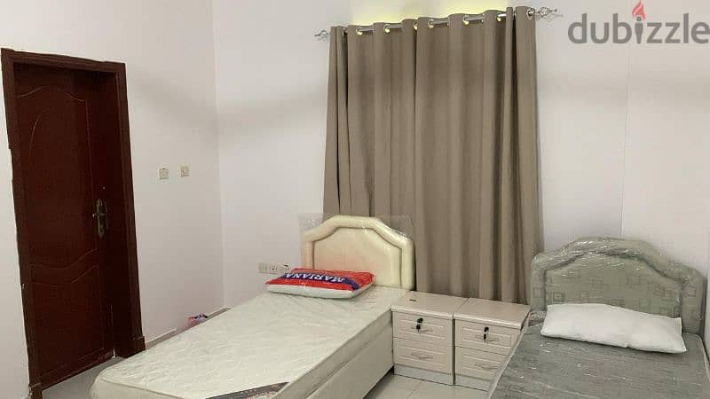 executive bed space for rent with bed and cupboard 2