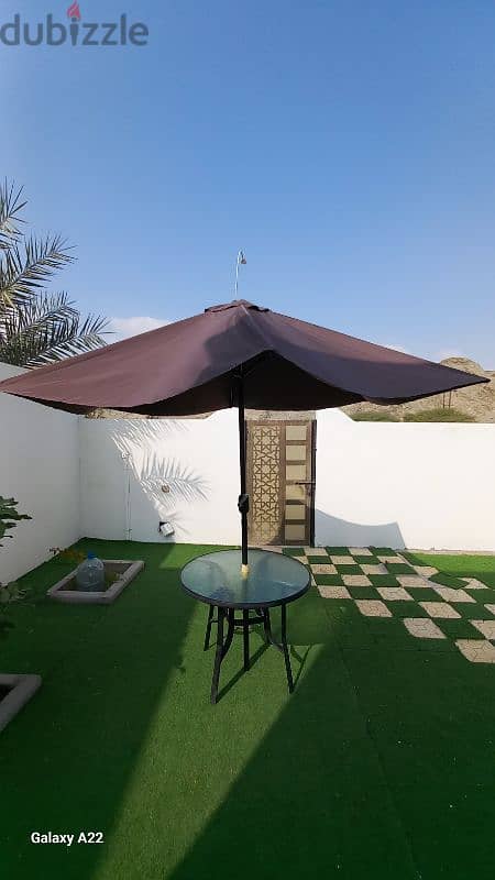 للبيع طاوله مع مظله نضيفة  For sale, a clean table with an umbrella 0