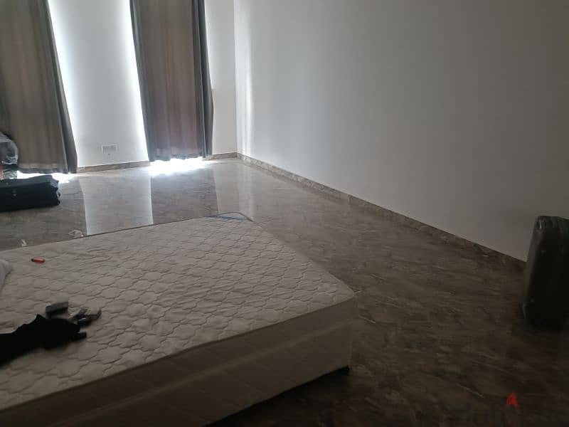 Semi furnished room for rent near Mall of Oman 0