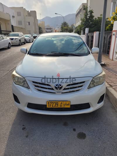 Expat driven White Corolla 2013 model in very good condition