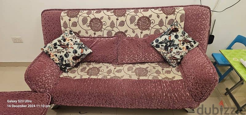 sofa convertible bed with 4 pillows,carpet,and teapot table 2