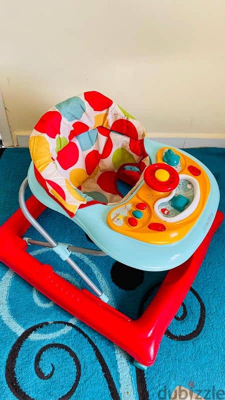 Baby walker, cycle, and bathtub for sale 3