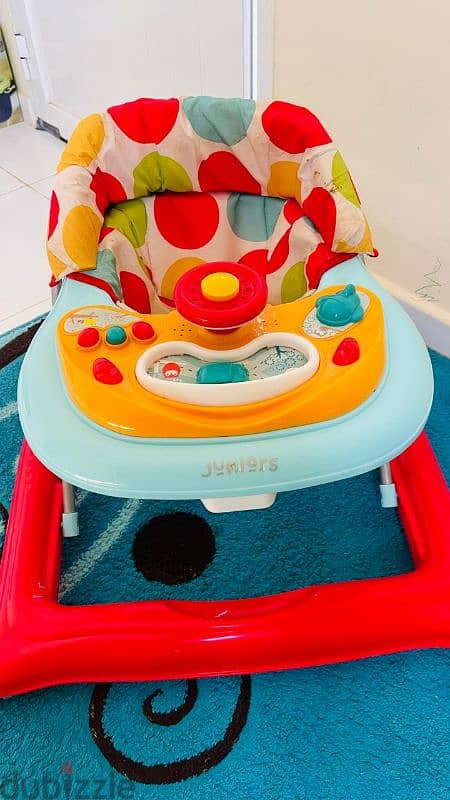 Baby walker, cycle, and bathtub for sale 5