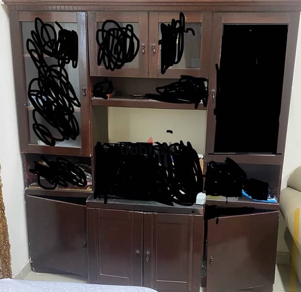 urgent sale of very nice tv cabinet with alot of storage 0