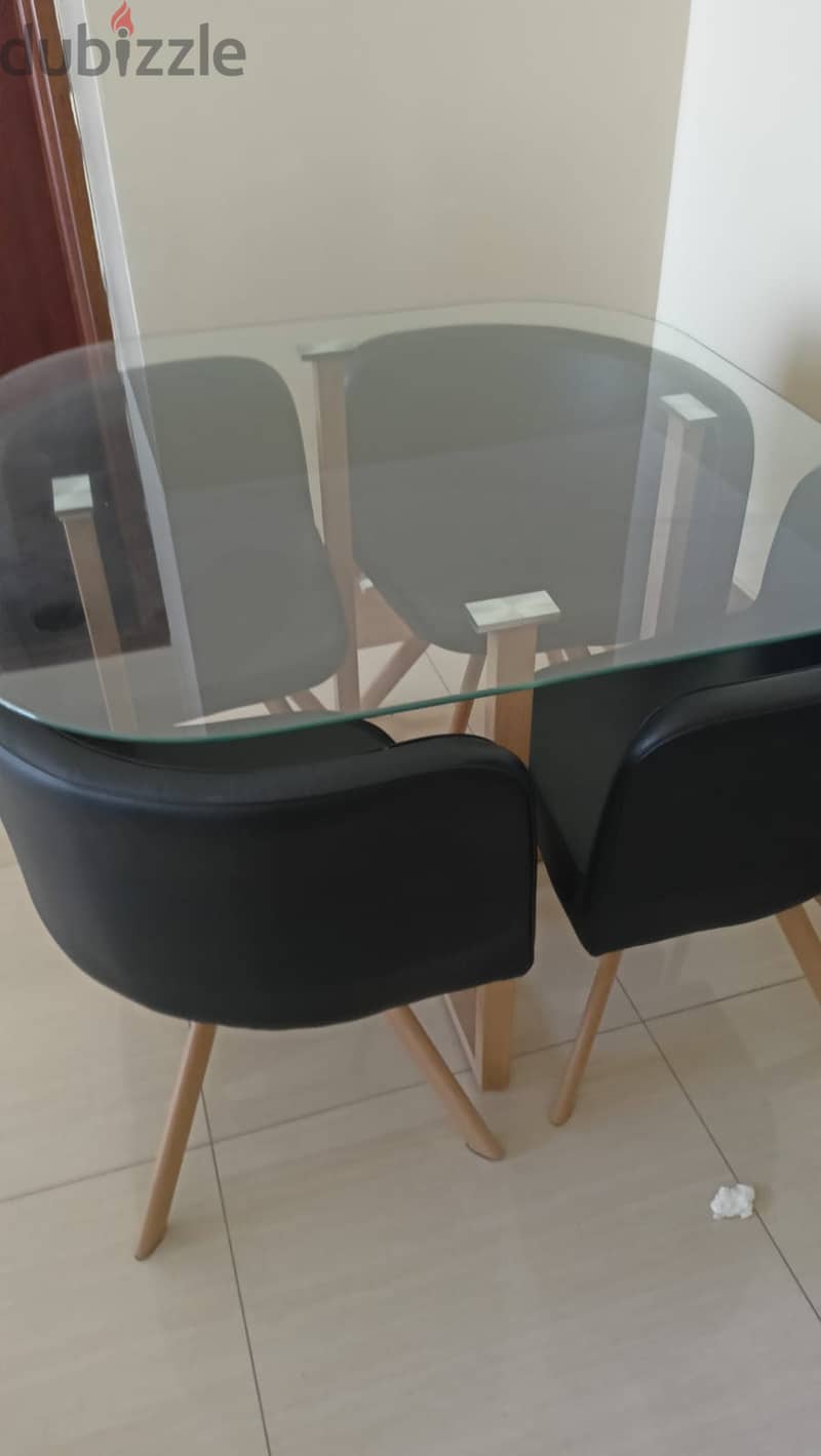 Square glass coffee table with 4 leather chairs 3