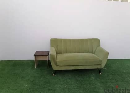 Three seater Sofa plus one stool