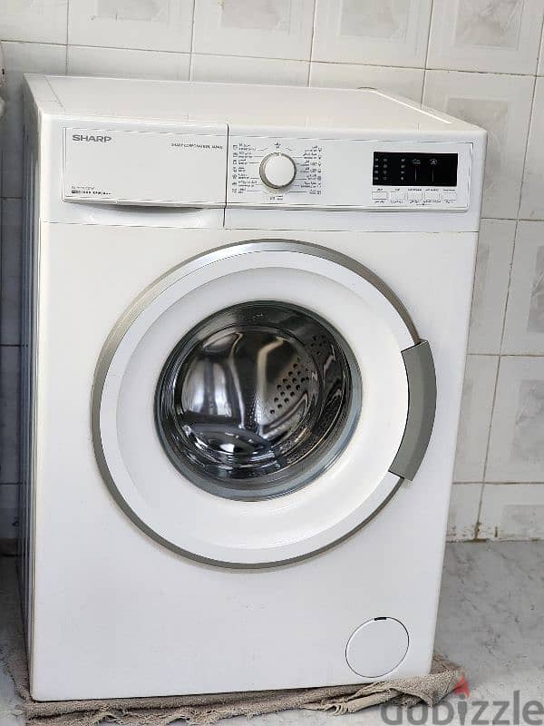 Used 7kg Sharp washing machine (spin not working) 1